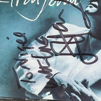 Elton John - The Very Best of CD. Signed by Elton John, personalised to Nigel