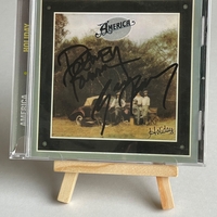 America - Holiday CD. Signed by Dewey Bunnell and Gerry Beckley