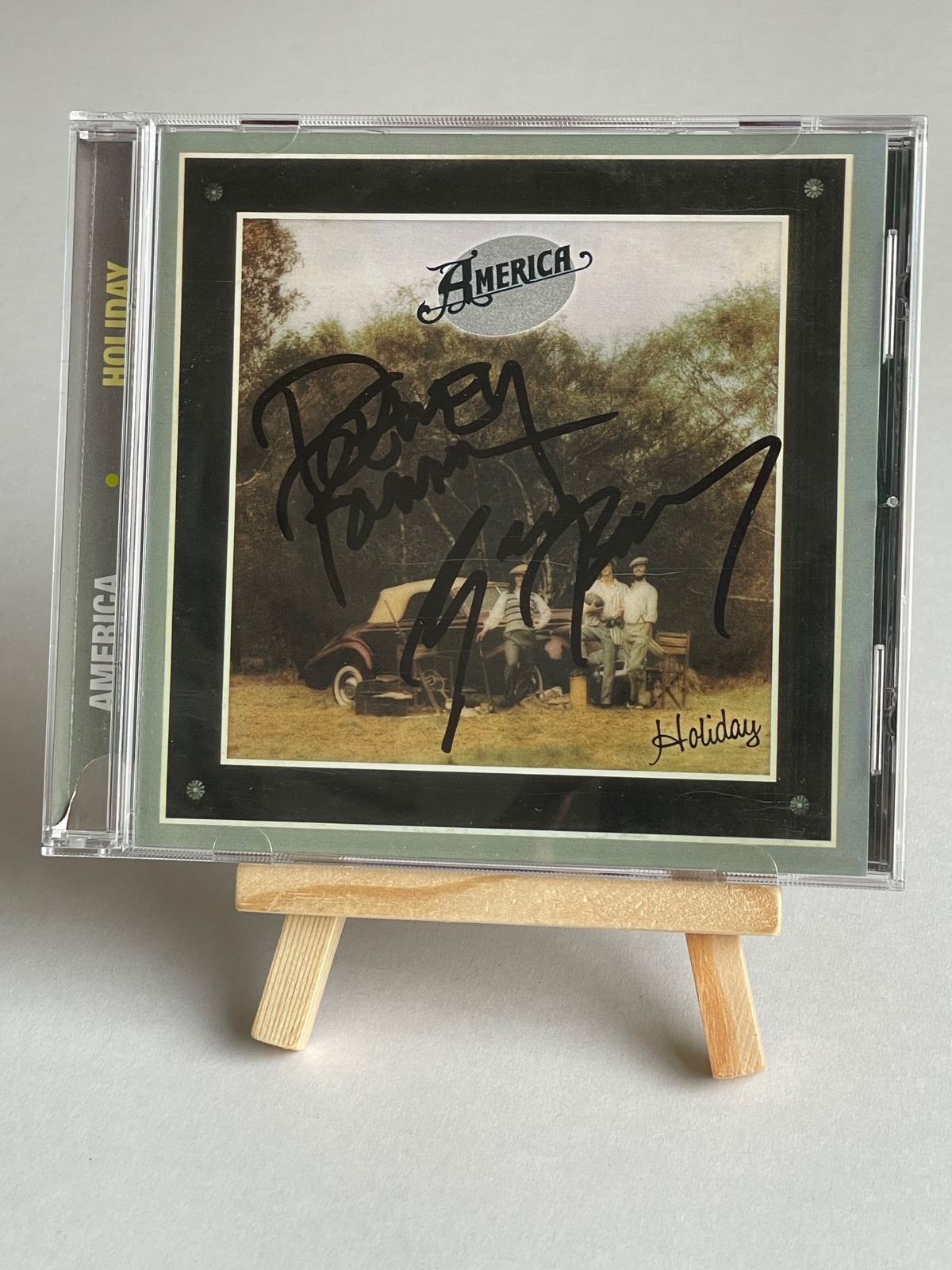 America - Holiday CD. Signed by Dewey Bunnell and Gerry Beckley