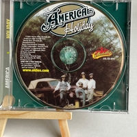 America - Holiday CD. Signed by Dewey Bunnell and Gerry Beckley