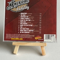 America - Holiday CD. Signed by Dewey Bunnell and Gerry Beckley