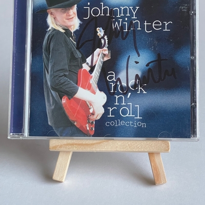 Johnny Winter -  rock n’ roll collection CD. Signed by Johnny Winter