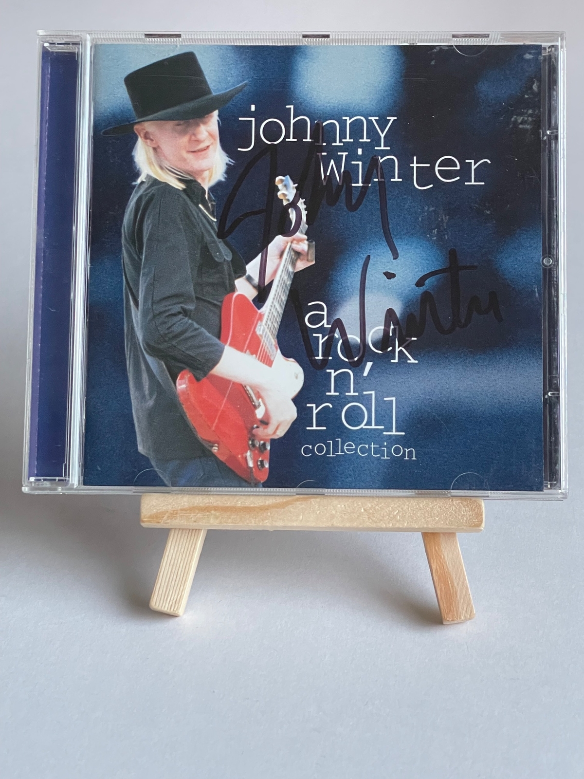 Johnny Winter -  rock n’ roll collection CD. Signed by Johnny Winter
