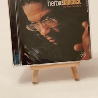 Herbie Hancock - The New Standard CD. Believed to be signed by Michael Brecker, John Schofield, Dave Holland and Herbie Hancock