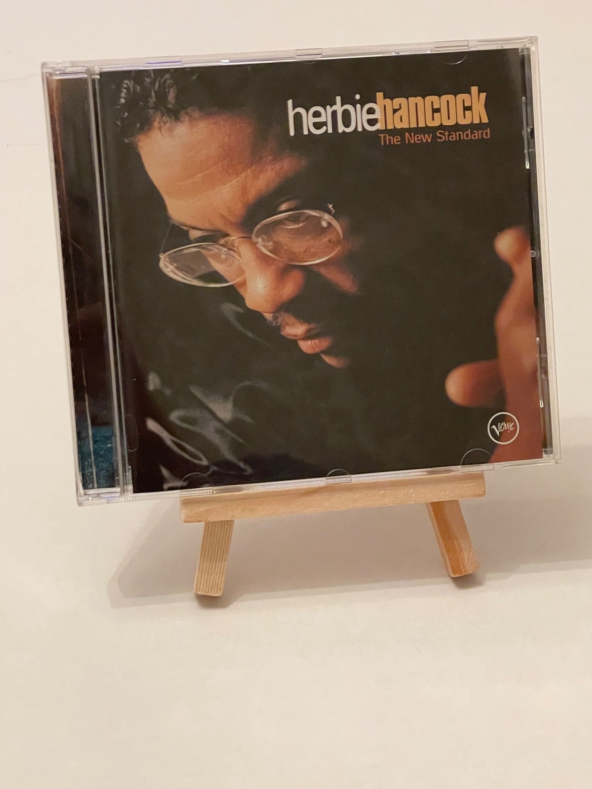 Herbie Hancock - The New Standard CD. Believed to be signed by Michael Brecker, John Schofield, Dave Holland and Herbie Hancock