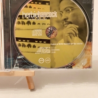 Herbie Hancock - The New Standard CD. Believed to be signed by Michael Brecker, John Schofield, Dave Holland and Herbie Hancock