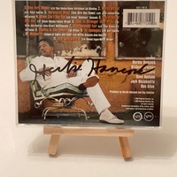 Herbie Hancock - The New Standard CD. Believed to be signed by Michael Brecker, John Schofield, Dave Holland and Herbie Hancock