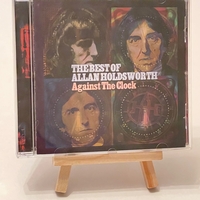 Allan Holdsworth - The Best of Allan Holdsworth. Against The Clock CD. Signed by Allan Holdsworth.