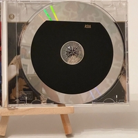Asia Gold CD. Believed to be signed by John Wetton and Geoff Downes