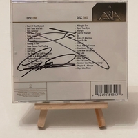Asia Gold CD. Believed to be signed by John Wetton and Geoff Downes