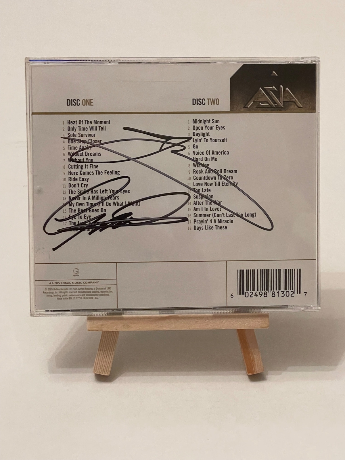 Asia Gold CD. Believed to be signed by John Wetton and Geoff Downes