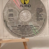 Free - The best of Free CD - All right now. Signed by Simon Kirke and Paul Rodgers