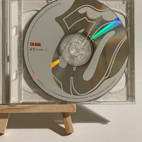 Rolling Stones - Forty Licks CD. Signed by Charlie Watts