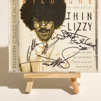 Thin Lizzy - Wild One - The Very Best Of Thin Lizzy CD. Signed by Darren Wharton, Scott Gorham, Marco Mendoza, John Sykes and Brian Robertson