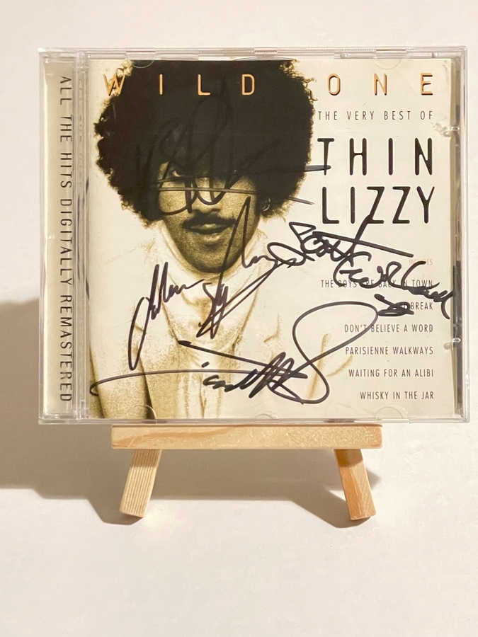 Thin Lizzy - Wild One - The Very Best Of Thin Lizzy CD. Signed by Darren Wharton, Scott Gorham, Marco Mendoza, John Sykes and Brian Robertson