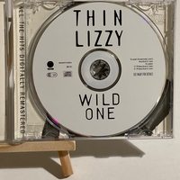 Thin Lizzy - Wild One - The Very Best Of Thin Lizzy CD. Signed by Darren Wharton, Scott Gorham, Marco Mendoza, John Sykes and Brian Robertson