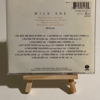 Thin Lizzy - Wild One - The Very Best Of Thin Lizzy CD. Signed by Darren Wharton, Scott Gorham, Marco Mendoza, John Sykes and Brian Robertson