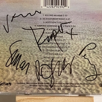 The Cure - Staring At The Sea CD. Signed by Robert Smith, Simon Gallup, Roger O’Donnell, Jason Cooper & Perry Bamonte