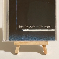 Eric Clapton - From The Cradle CD. Signed by Eric Clapton and Steve Daly