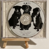 Eric Clapton - From The Cradle CD. Signed by Eric Clapton and Steve Daly
