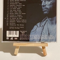 Eric Clapton - From The Cradle CD. Signed by Eric Clapton and Steve Daly
