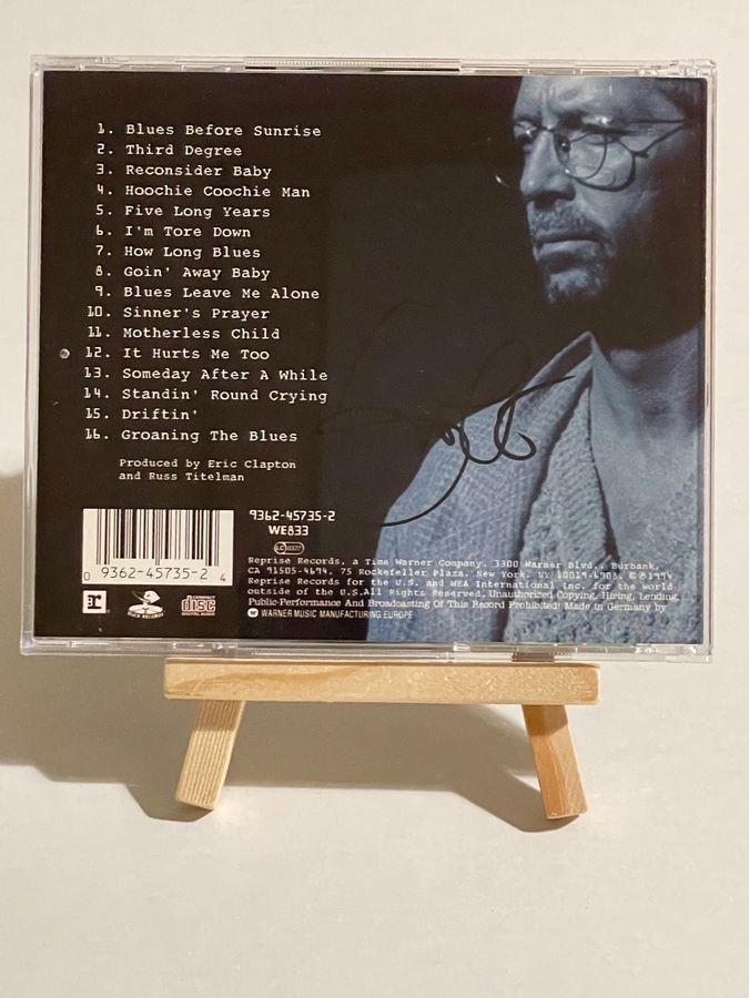 Eric Clapton - From The Cradle CD. Signed by Eric Clapton and Steve Daly