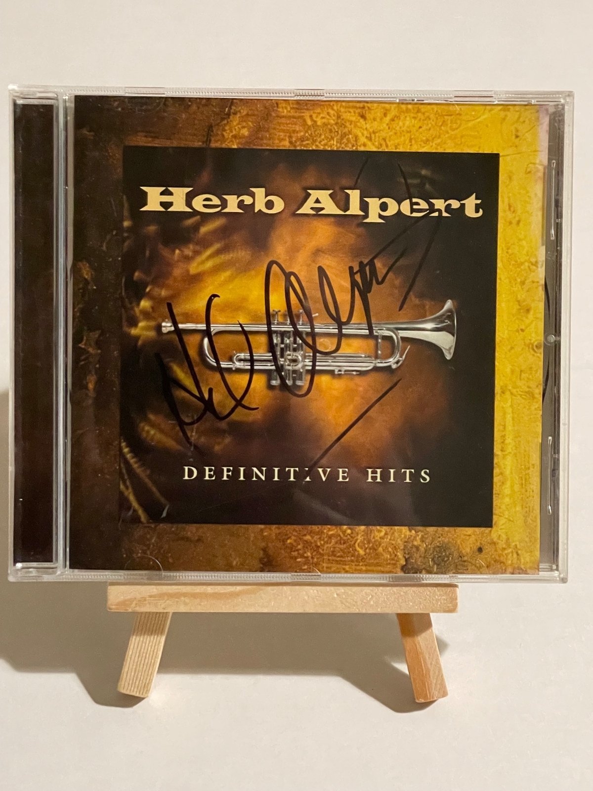 Herb Alpert - Definitive Hits. Signed by Herb Alpert