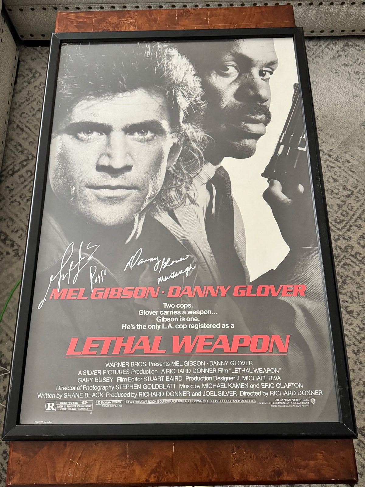 Lethal Weapon - Mel Gibson & Danny Glover signed/inscribed one sheet 27"x40"