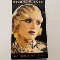 Roxy Music - The Thrill Of It All CD. Signed by Brian Eno, Andy Mackay, Jerry Hall, Paul Thompson, Phil Manzera and Bryan Ferry