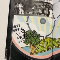 Roxy Music - The Thrill Of It All CD. Signed by Brian Eno, Andy Mackay, Jerry Hall, Paul Thompson, Phil Manzera and Bryan Ferry