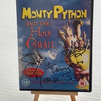Monty Python and The Holy Grail DVD, signed by John Cleese, Eric Idle, Terry Jones, Michael Palin, Carol Cleveland and Terry Gillam