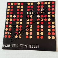 Air - Premiers Symptomes. Signed by Nicholas Godwin and Jean-Benoit Dunckel.