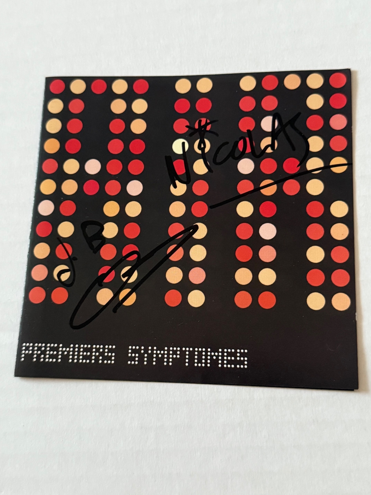 Air - Premiers Symptomes. Signed by Nicholas Godwin and Jean-Benoit Dunckel.