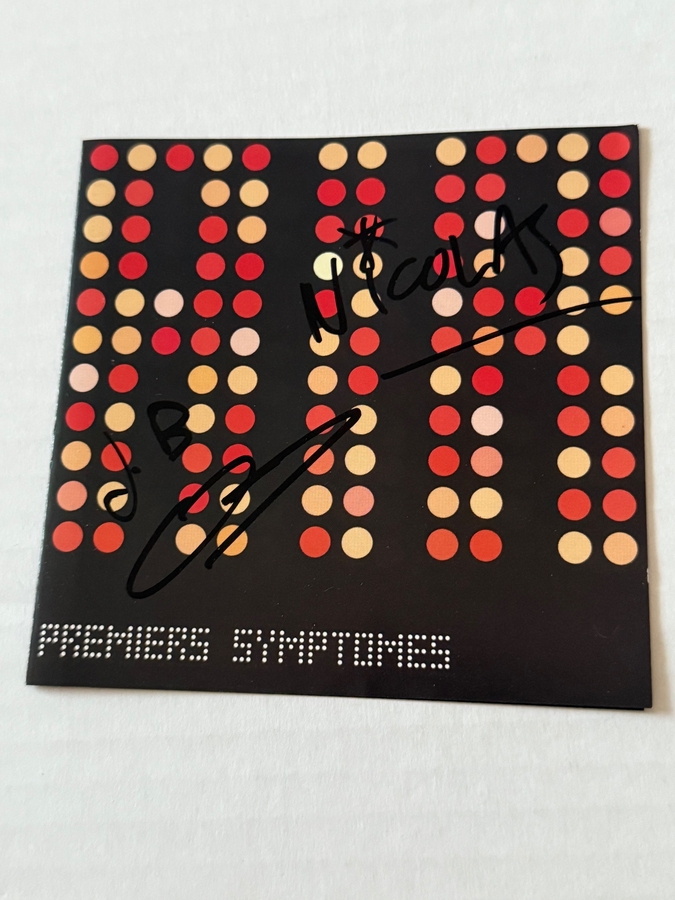 Air - Premiers Symptomes. Signed by Nicholas Godwin and Jean-Benoit Dunckel.