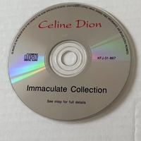 Celine Dion - Immaculate Collection CD. Signed by Celine Dion.