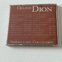 Celine Dion - Immaculate Collection CD. Signed by Celine Dion.
