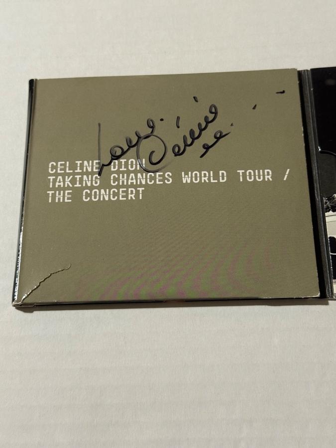 Celine Dion - Taking Chances World Tour - The Concert. Inside cover (torn) and CD booklet Signed by Celine Dion.