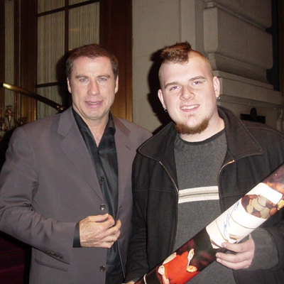John Travolta RACC Profile